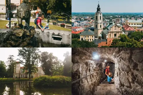 Dzieci bawią się przy fontannie z niedźwiedziem, widok na miasto z wieżą kościelną, pałac nad jeziorem i schody w jaskini. Warto przemyśl atrakcje!